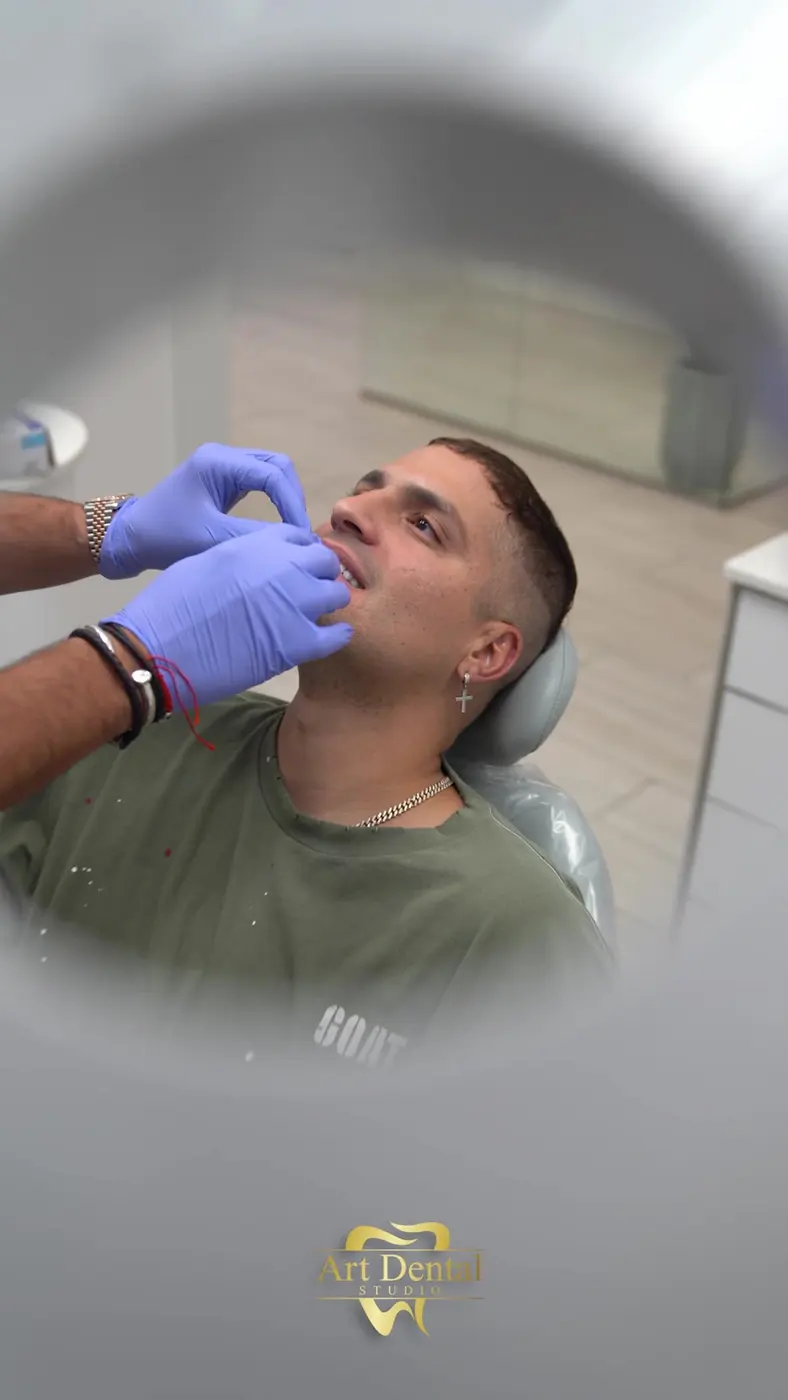 Dale Pututi behind the scenes at Art Dental Studio